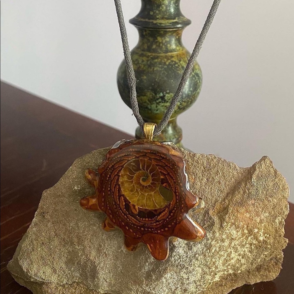 Third eye pinecone centered with raw ammonite fossil